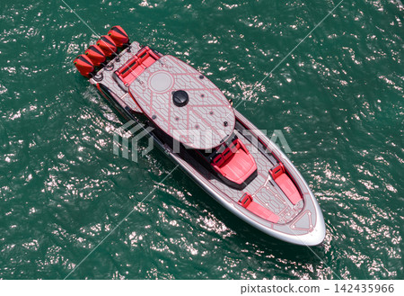 Vacation tour on summer. Aerial view motorboat. Yacht boat tour. Luxury boat yachting. Motorboat sailing at sea. Luxury private yacht in sea. Motor yacht luxury vessel. Boat motor aerial Vacation tour on summer. Aerial view motorboat. Yacht boat tour. Luxury boat yachting. Motorboat sailing at sea. Luxury private yacht in sea. Motor yacht luxury vessel. Boat motor aerial 142435966