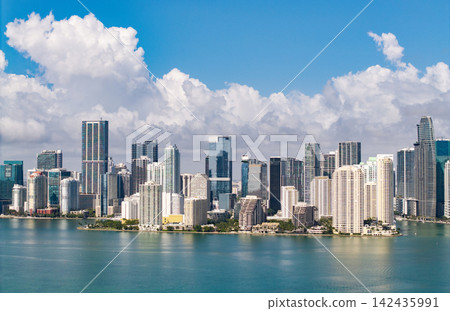 Aerial view of Brickell skyline in downtown Miami. Skyscrapers above Miami. Scenic panorama of Miamis financial district. Brickell in Miami city. Miami Urban landscape with buildings cityscape. Aerial view of Brickell skyline in downtown Miami. Skyscrapers above Miami. Scenic panorama of Miamis financial district. Brickell in Miami city. Miami Urban landscape with buildings cityscape. 142435991