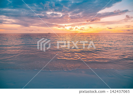 Serene pastel dusk soft glowing sky rippled calm tropical sea muted dreamy horizon warm reflection. Summer seascape wall art scenic. Coastal evening backdrop decor wallpaper Serene pastel dusk soft glowing sky rippled calm tropical sea muted dreamy horizon warm reflection. Summer seascape wall art scenic. Coastal evening backdrop decor wallpaper 142437065