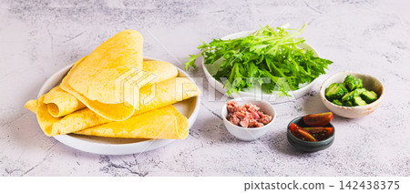 Ingredients for making rolls with tuna, vegetables and herbs on a plate on the table web banner Ingredients for making rolls with tuna, vegetables and herbs on a plate on the table web banner 142438375