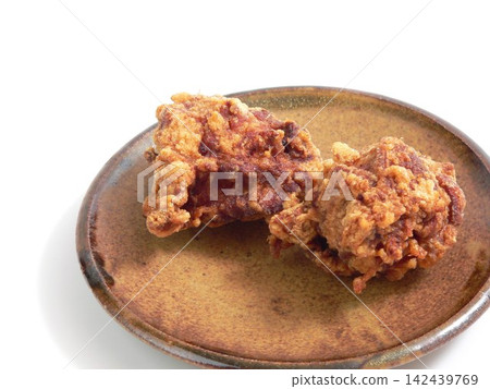 Close-up of two pieces of fried chicken Close-up of two pieces of fried chicken 142439769