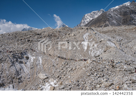 Group of traffic tourist while trekking to Everest Base Camp in Nepal. EBC trek is one of Nepal's best trekking destination. Group of traffic tourist while trekking to Everest Base Camp in Nepal. EBC trek is one of Nepal's best trekking destination. 142442358