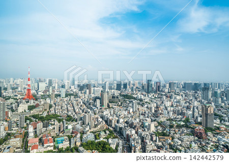 Panoramic aerial view of tokyo tower and cityscape skyline under clear blue sky in Roppongi hills, japan with copy space Panoramic aerial view of tokyo tower and cityscape skyline under clear blue sky in Roppongi hills, japan with copy space 142442579