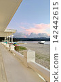 Sunset on the beach and pier - Magic hour floating on the Okinawan coast 142442615