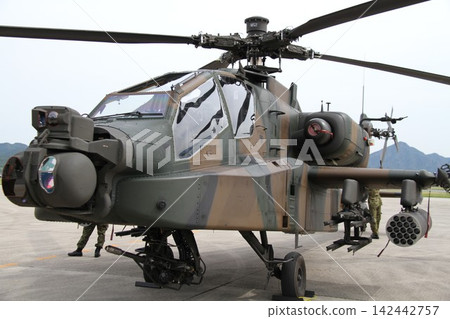 Japan Ground Self-Defense Force AH-64D Apache Longbow attack helicopter on ground display. Japan Ground Self-Defense Force AH-64D Apache Longbow attack helicopter on ground display. 142442757