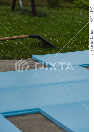 Preparing ground with XPS insulation for backyard pool installation Preparing ground with XPS insulation for backyard pool installation 142443742