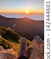 Witnessing the sunrise from the summit of Mt. Tsubakuro 142444601