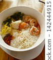 Thai-style porridge with lots of ingredients 142444915