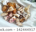 Grilled squid bought at a market in Thailand 142444917
