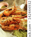 Charcoal-grilled shrimp 142444932