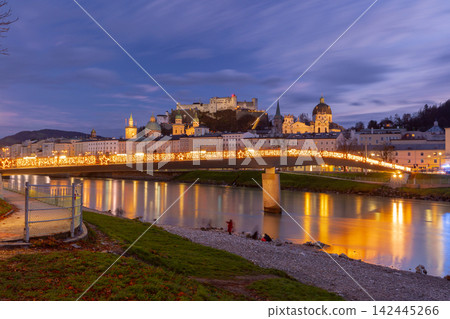 Salzburg Old Town and Illuminated Bridge Across Salzach River at Blue Hour Salzburg Old Town and Illuminated Bridge Across Salzach River at Blue Hour 142445266