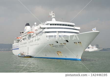 The cruise ship Pacific Venus anchored in Ha Long Bay. The cruise ship Pacific Venus anchored in Ha Long Bay. 142446195