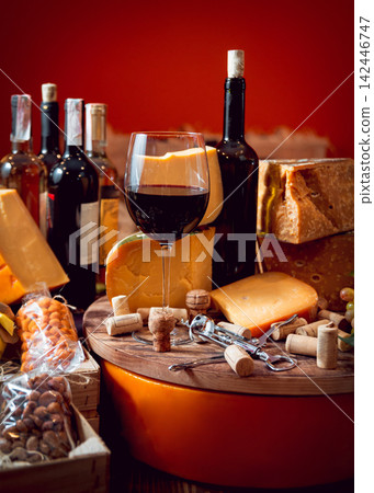 Cheese and wine on a dark table. Cheese and wine on a dark table. 142446747