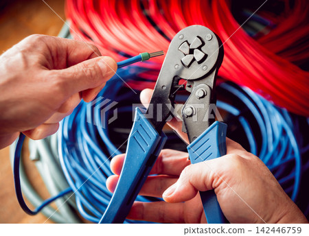 Electrical equipment. Electricity cable and crimper. Electrical equipment. Electricity cable and crimper. 142446759