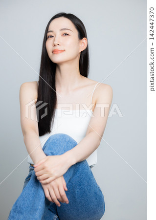 Beauty image of a woman with long hair Beauty image of a woman with long hair 142447370