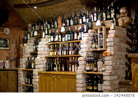 Wine bottles on a rack Wine bottles on a rack 142448078
