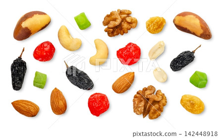 Set of dried fruits and nuts isolated on a white background. Top view Set of dried fruits and nuts isolated on a white background. Top view 142448918