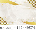 Gold leaf brush and Japanese patterned washi paper background 142449574