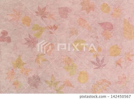 Autumn-colored washi paper with pressed leaves incorporated into the pulp. Autumn-colored washi paper with pressed leaves incorporated into the pulp. 142450567