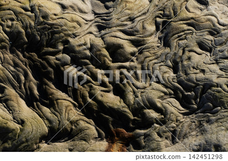 Abstract natural rock formation showing intricate patterns Abstract natural rock formation showing intricate patterns 142451298