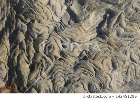 Sandstone patterns shaped by natural erosion forces 142451299