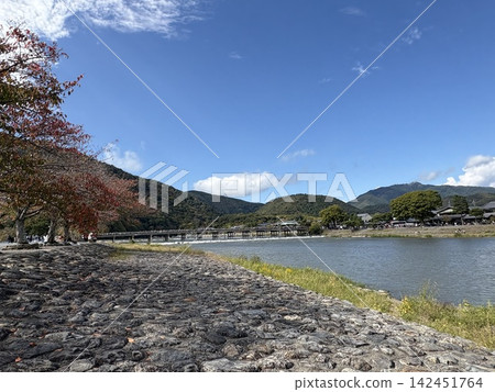 Kyoto's Togetsukyo Bridge viewed from a distance (sunny) Kyoto's Togetsukyo Bridge viewed from a distance (sunny) 142451764