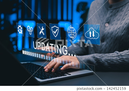System Updating and Software Maintenance Concept. Woman using laptop with update progress bar, cloud, security system icons representing software improvement, data synchronization, digital maintenance System Updating and Software Maintenance Concept. Woman using laptop with update progress bar, cloud, security system icons representing software improvement, data synchronization, digital maintenance 142452159
