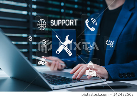 Technical support and customer service concept. Professional using laptop with support icons represents technical assistance, customer service, 24/7 help solutions in business. Call center, help desk Technical support and customer service concept. Professional using laptop with support icons represents technical assistance, customer service, 24/7 help solutions in business. Call center, help desk 142452502