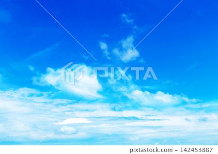 blue sky background with tiny clouds blue sky background with tiny clouds 142453887