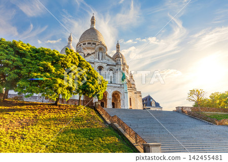 Sacred Heart Basilica in Montmartre in warm golden sunset light with no people, Paris, France Sacred Heart Basilica in Montmartre in warm golden sunset light with no people, Paris, France 142455481
