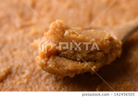 Close-up of Japanese miso paste in a wooden spoon 142456505