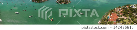 Aerial panoramic view of Miami skyline. Panoramic cityscape of Miami with coastal skyscrapers. Panoramic view of Miami Beach from above. Iconic landmarks line of Miami coastline. Miamis famous 142456613