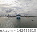 Aerial view cruise ship on summer vacation tour. Cruise ship vacation and travel by sea. Aerial view luxury liner. Ship leaving Miami beach port. Cruise ship vacation. Sail the sea 142456615