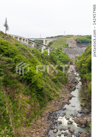 The Shirakawa River flows beneath the First Shirakawa Bridge. The Shirakawa River flows beneath the First Shirakawa Bridge. 142457466
