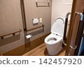 Toilets equipped with handrails and emergency buttons 142457920