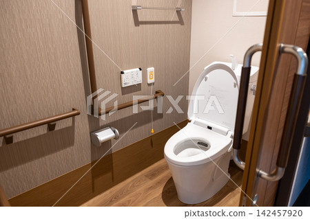 Toilets equipped with handrails and emergency buttons Toilets equipped with handrails and emergency buttons 142457920