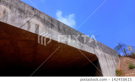 Concrete overpass and a clear blue sky Concrete overpass and a clear blue sky 142458615