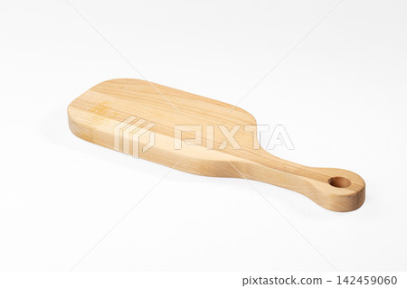 Wooden cutting board on white background with natural grain and handle hole 142459060