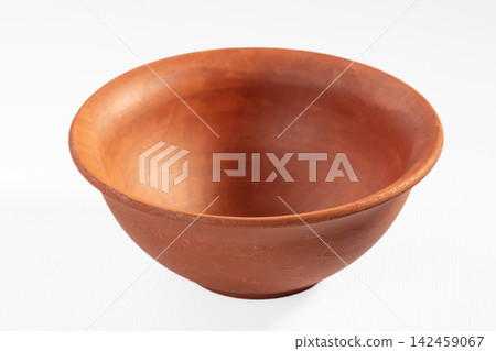 Empty terracotta bowl on white background Empty terracotta bowl on white background 142459067