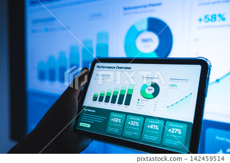 Businessmen checking performance graphs on their tablets Businessmen checking performance graphs on their tablets 142459514