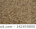 Brown pebble wash texture with small gravel stones background 142459800