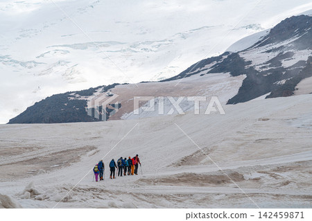 Climbers traversing a mountain Elbrus glacier Climbers traversing a mountain Elbrus glacier 142459871