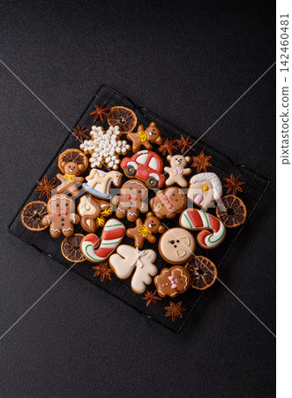 Sweet, colorful, homemade Christmas gingerbread cookies. Christmas gingerbread cookies Sweet, colorful, homemade Christmas gingerbread cookies. Christmas gingerbread cookies 142460481