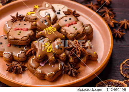 Sweet, colorful, homemade Christmas gingerbread cookies. Christmas gingerbread cookies Sweet, colorful, homemade Christmas gingerbread cookies. Christmas gingerbread cookies 142460496