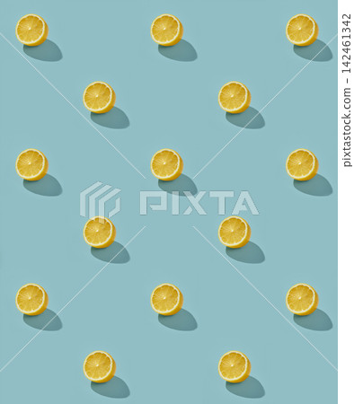 Fresh Half Lemons Pattern on Sunny Blue Background Fresh Half Lemons Pattern on Sunny Blue Background 142461342