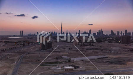 Sunset with skyline of Downtown Dubai in the evening timelapse. Sunset with skyline of Downtown Dubai in the evening timelapse. 142461589