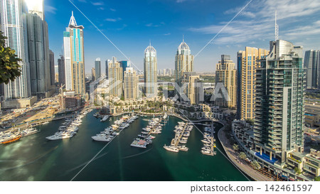 Aerial view timelapse of Dubai Marina at day time in Dubai, UAE Aerial view timelapse of Dubai Marina at day time in Dubai, UAE 142461597