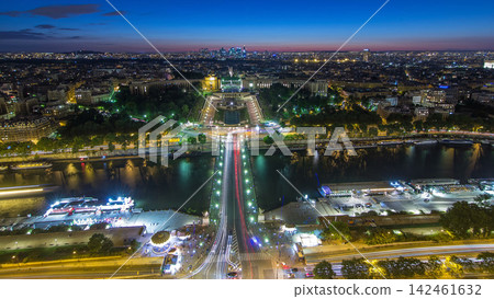 Aerial view over Trocadero day to night timelapse with the Palais de Chaillot seen from the Eiffel Tower in Paris, France. Aerial view over Trocadero day to night timelapse with the Palais de Chaillot seen from the Eiffel Tower in Paris, France. 142461632