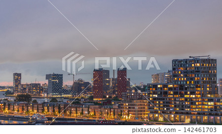 Panoramic aerial day to night timelapse of Katendrecht peninsula and Maashaven harbour in Rotterdam, The Netherlands. Panoramic aerial day to night timelapse of Katendrecht peninsula and Maashaven harbour in Rotterdam, The Netherlands. 142461703