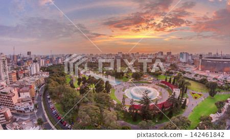 Aerial sunset view to Park of the Reserve with magic water circuit biggest fountain complex timelapse 142461842